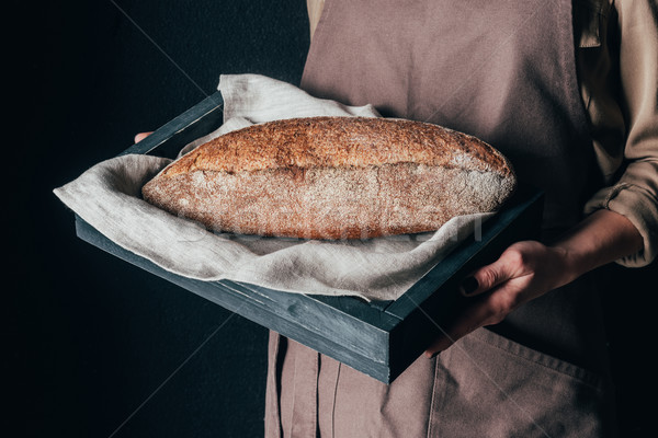 Shot vrouw houten vak brood Stockfoto © LightFieldStudios