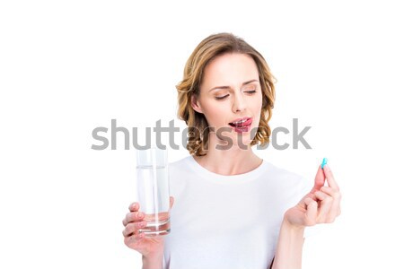 Frau Glas Wasser Pille isoliert Stock foto © LightFieldStudios