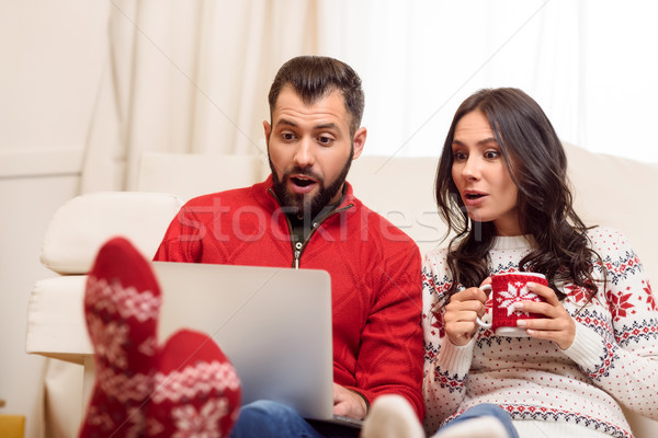 couple using laptop Stock photo © LightFieldStudios
