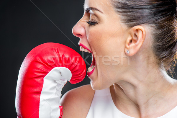 Nő boxkesztyű közelkép portré fiatal nő kiált Stock fotó © LightFieldStudios