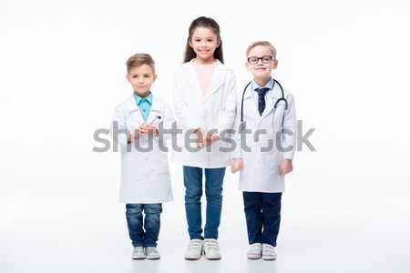 Сток-фото: детей, · играющих · врачи · три · улыбаясь · дети · медицинской