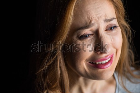 Young woman crying  Stock photo © LightFieldStudios