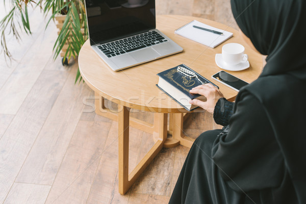 muslim woman with quran book Stock photo © LightFieldStudios