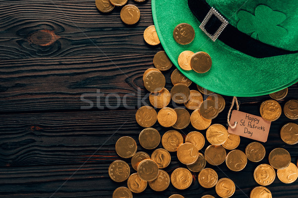 Stock photo: top view of green hat and golden coins, st patricks day concept