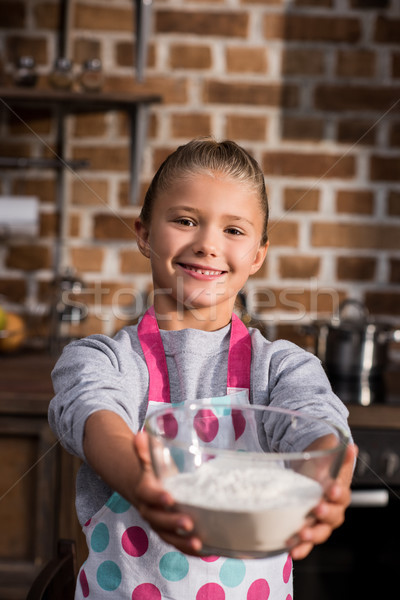smiling kid holding bowl  Stock photo © LightFieldStudios