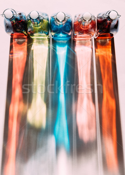 Arco iris oscuridad vidrio botellas superior vista Foto stock © LightFieldStudios