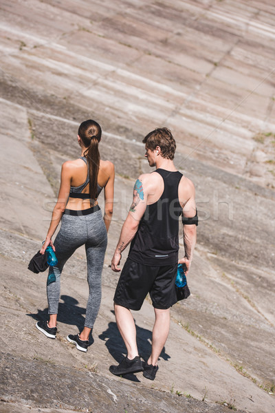 sportive couple walking on slabs Stock photo © LightFieldStudios