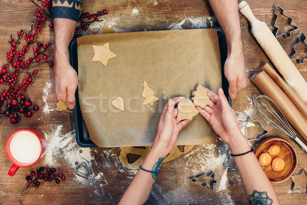 christmas cookies on baking paper Stock photo © LightFieldStudios