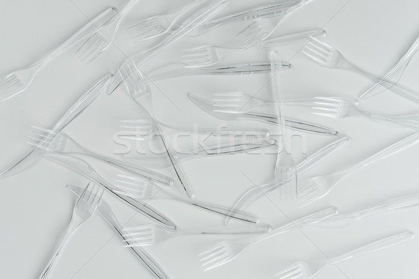 top view of set of various plastic cutlery isolated on grey Stock photo © LightFieldStudios