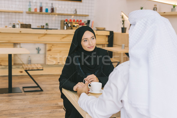 muslim couple having date in cafe Stock photo © LightFieldStudios