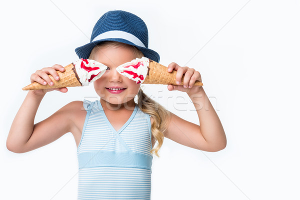 Stock photo: child in swimsuit with ice cream   