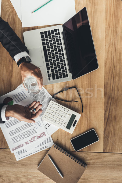 Işadamı hapları işyeri üst görmek cam Stok fotoğraf © LightFieldStudios