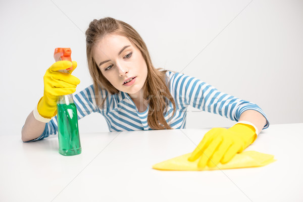 Stock photo: Woman cleaning surface 