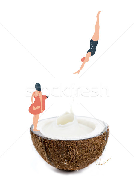 woman dive into coconut half Stock photo © LightFieldStudios