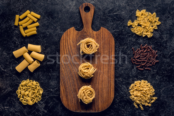 Foto d'archivio: Pasta · greggio · legno · tagliere · pietra