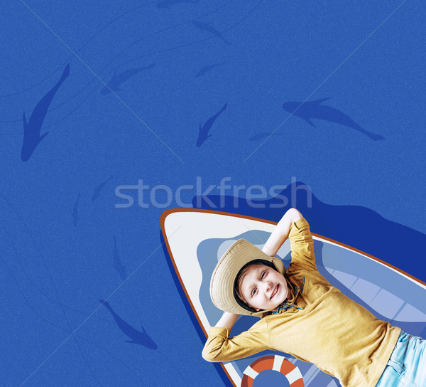 boy on floating boat  Stock photo © LightFieldStudios