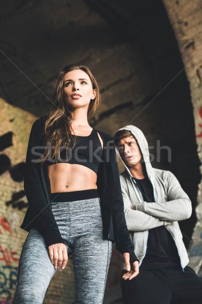stylish couple in sportswear Stock photo © LightFieldStudios
