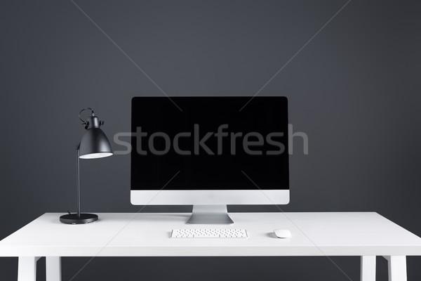 desktop computer with blank screen with keyboard and computer mouse on table  Stock photo © LightFieldStudios