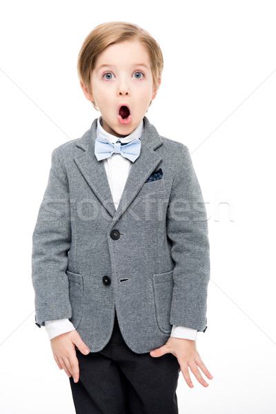 Geschokt weinig jongen pak naar camera Stockfoto © LightFieldStudios