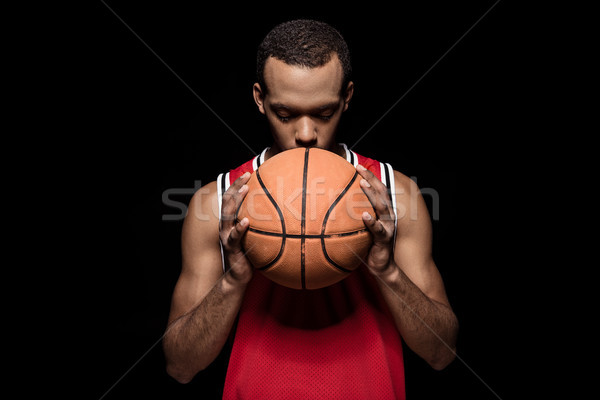 Afroamerikai kosárlabdázó pózol labda fekete sportok Stock fotó © LightFieldStudios