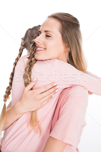 mother and daughter hugging together Stock photo © LightFieldStudios