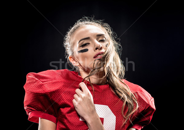 Привлекательная женщина американский футболист портрет равномерный Сток-фото © LightFieldStudios