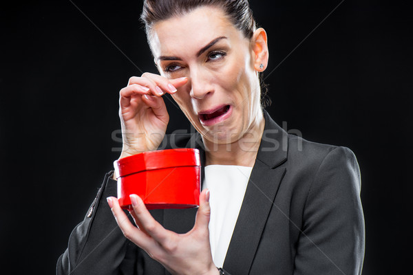 Businesswoman holding red toy heart  Stock photo © LightFieldStudios