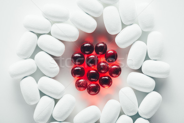 white and red pills Stock photo © LightFieldStudios