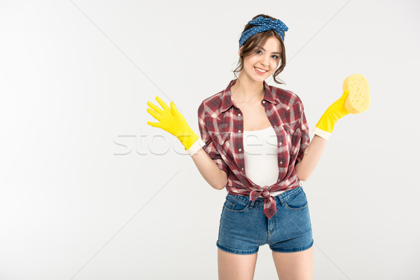 Mulher jovem esponja belo jovem dona de casa luvas Foto stock © LightFieldStudios