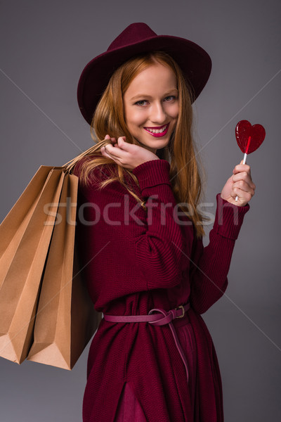 Stock photo: girl with shopping bags