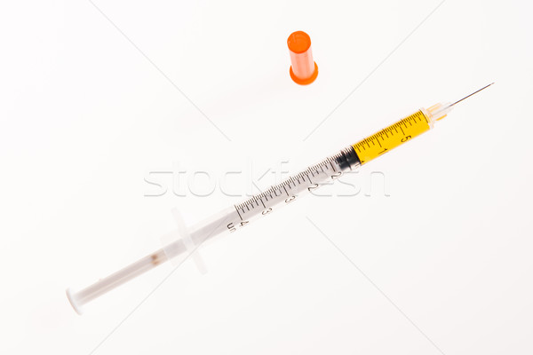 Insulin syringe for diabetes isolated on white, medicine and health care concept  Stock photo © LightFieldStudios