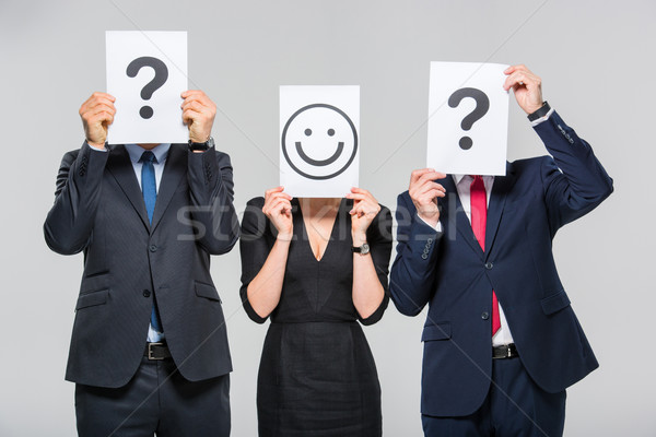 Stock photo: Businesspeople holding cards