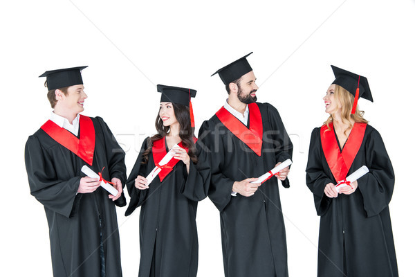 Grupo los hombres jóvenes mujeres graduación amigos Foto stock © LightFieldStudios