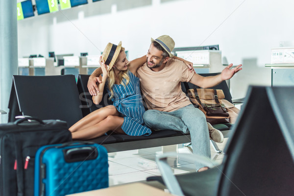 Paar wachten boarding luchthaven gelukkig liefde Stockfoto © LightFieldStudios