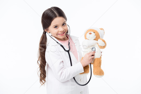 Foto d'archivio: Bambina · giocare · medico · sorridere · ascolto · orsacchiotto