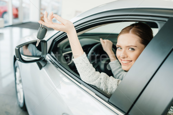 快樂 年輕女子 關鍵 坐在 新車 商業照片 © LightFieldStudios