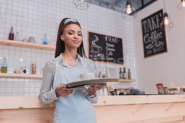 Stock photo: barista holding tray with order