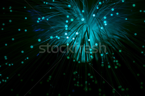 shiny blue fiber optics background Stock photo © LightFieldStudios