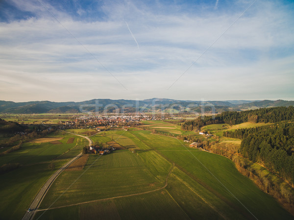 Aerial view of majestic landscape with green field and town in Germany Stock photo © LightFieldStudios