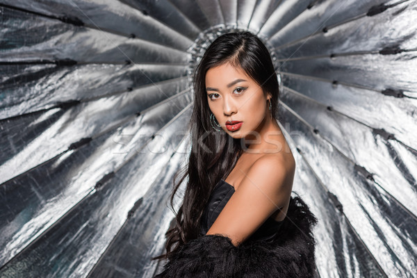 Stock photo: woman wearing ostrich feathers coat