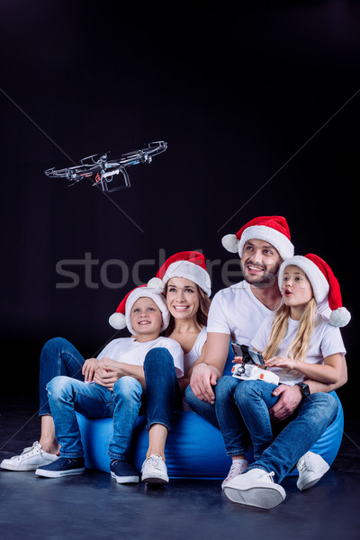 Family using hexacopter drone Stock photo © LightFieldStudios