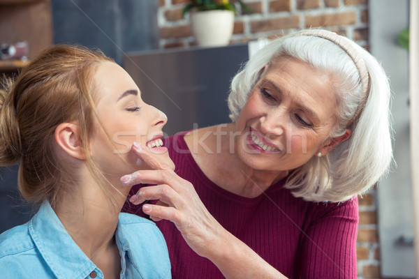 Happy grandmother and granddaughter Stock photo © LightFieldStudios