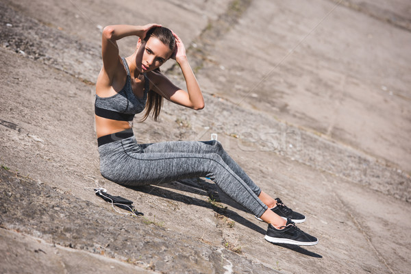 woman doing abs exercise Stock photo © LightFieldStudios