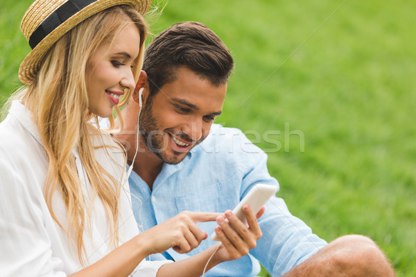 couple using smartphone Stock photo © LightFieldStudios