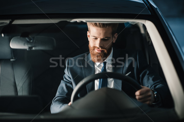 [[stock_photo]]: Souriant · barbu · jeunes · affaires · séance · nouvelle · voiture