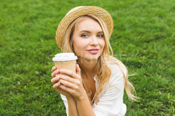 woman with coffee to go Stock photo © LightFieldStudios