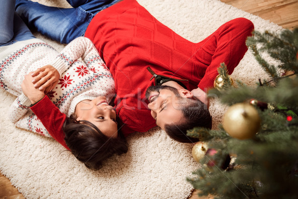 happy couple at christmastime Stock photo © LightFieldStudios