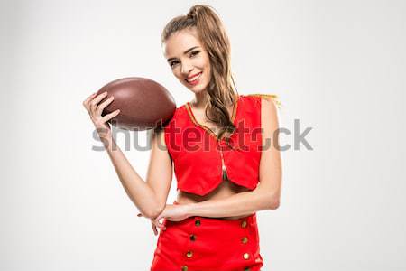 Cheerleader posant casque Homme regarder caméra [[stock_photo]] © LightFieldStudios