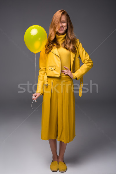 fashionable girl in yellow clothes Stock photo © LightFieldStudios