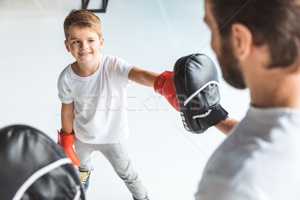 Père en fils boxe ensemble mise au point sélective cute souriant [[stock_photo]] © LightFieldStudios